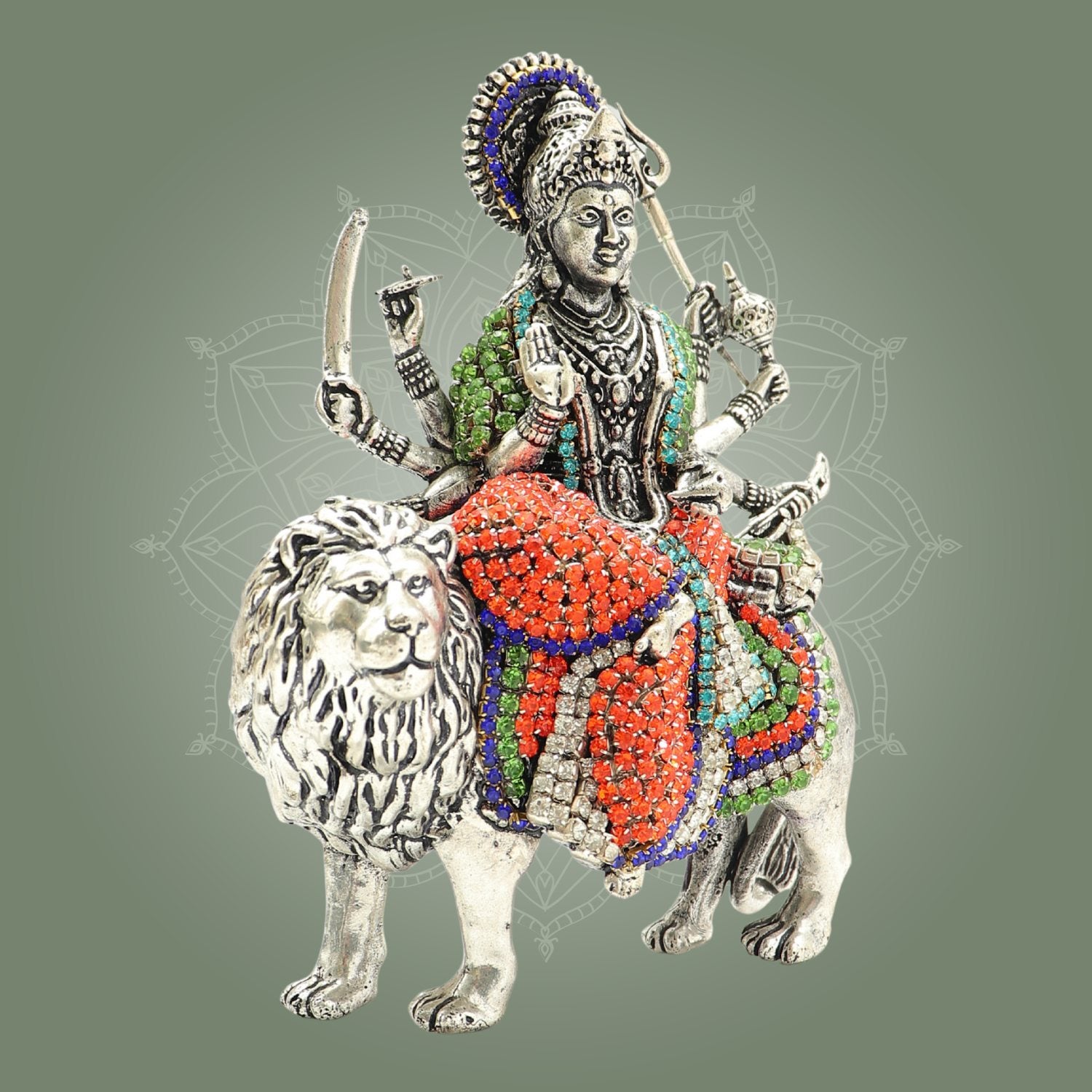 Decorative figurine of a person on a lion with intricate detailing and colorful patterns.