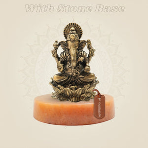 Ganesha Brass Idol on yellow stone