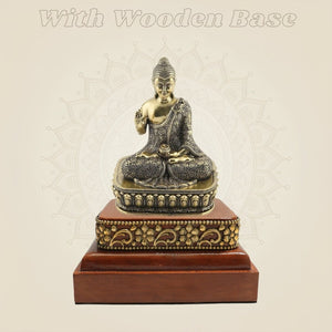 Brass Buddha Statue Composed on a Square Wooden Base