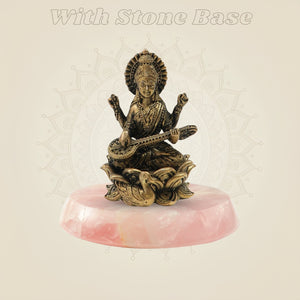 Bronze Chaturbhuja Saraswati Idol on Lotus on pink stone