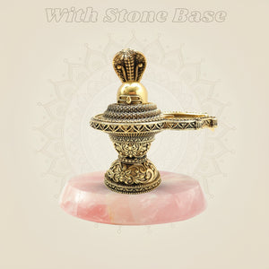 Brass Shivling with pink stone