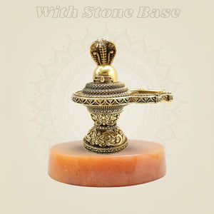 Brass Shiva Lingam on gemstone