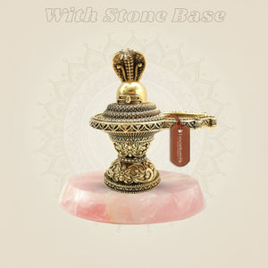 Brass Shivling with pink stone