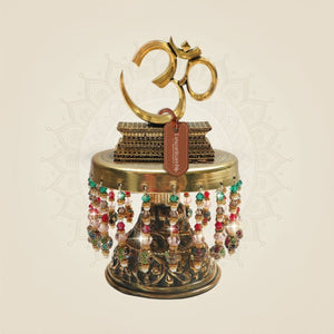 6" Brass Om Symbol on Stand with Chowki for Positive Energy Flow - Luxeartisanship