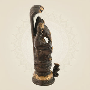 Brass Ganesha Seated on Sheshnaag