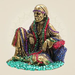 Brass Sai Baba Seated Statue 4" with Vibrant Jewellery Stone Detailing - Luxeartisanship
