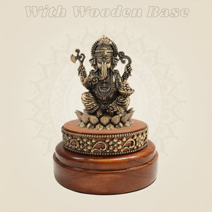 Chaturbhuj Ganesha Brass Statue 3" on a Wooden Base for Wealth - Luxeartisanship