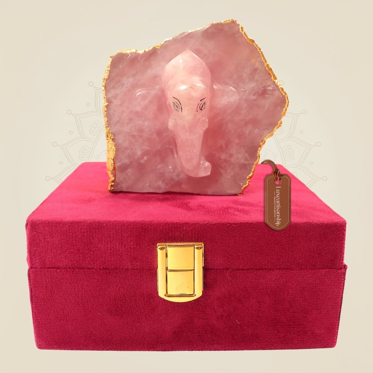 Hand-Carved Rose Quartz Ganesha Figurine on Natural Stone Base – Spiritual Decor - Luxeartisanship