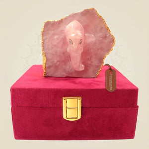 Hand-Carved Rose Quartz Ganesha Figurine on Natural Stone Base – Spiritual Decor - Luxeartisanship