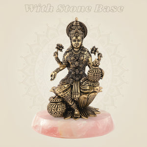 Lakshmi on Lotus Idol on stone base