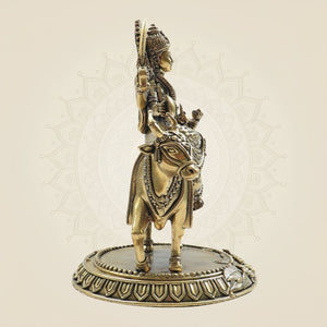 Brass Goddess Murti Seated Gracefully on Cow