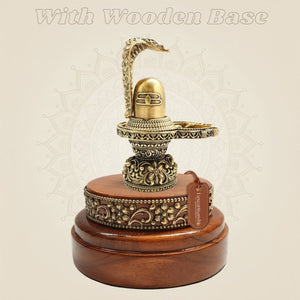 Traditional Brass Shiva Lingam with Naag Canopy on Wooden Base 4.25" - Luxeartisanship