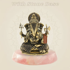 Brass Ganesha idol on stone base