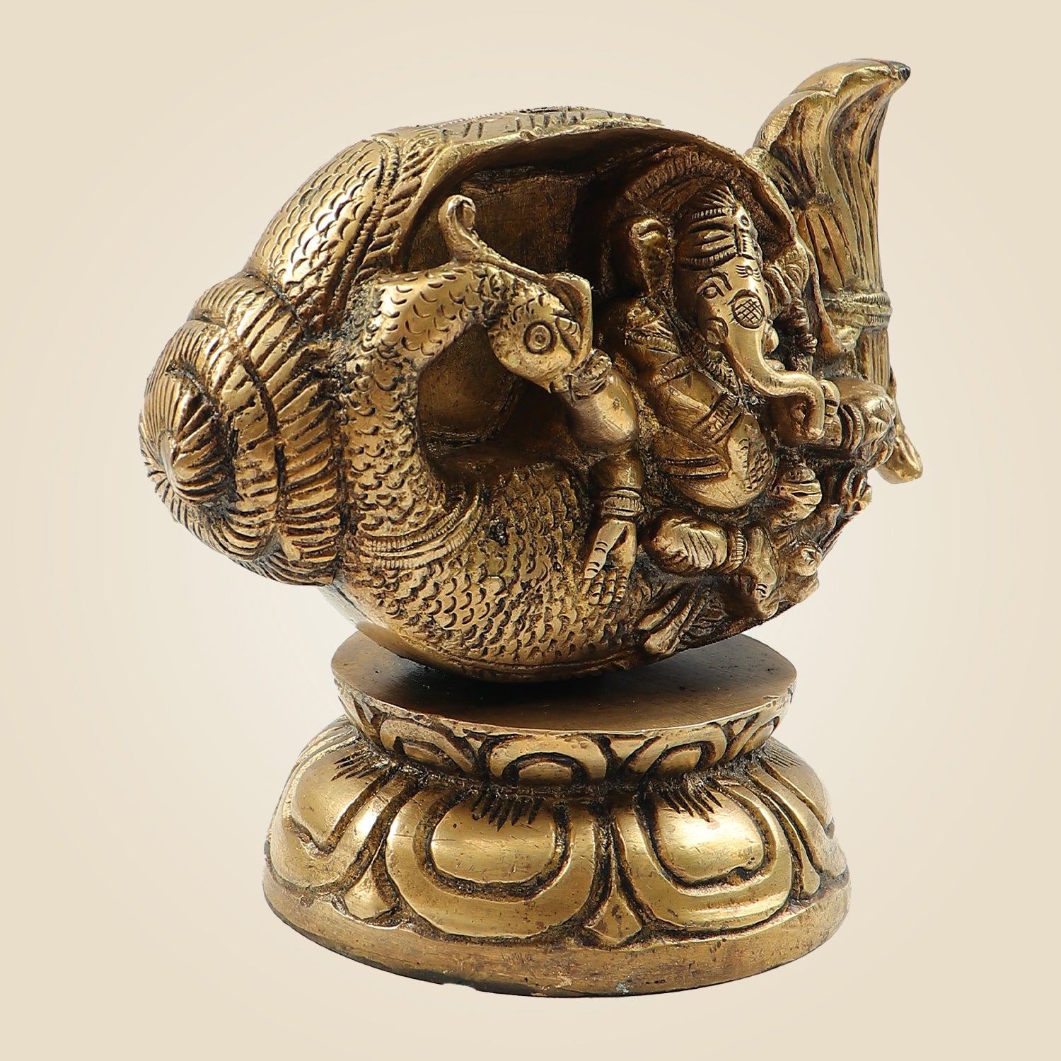 Divine Brass Ganesh Sitting in Shankh on Peacock Design Idol for Home Décor 5.5"