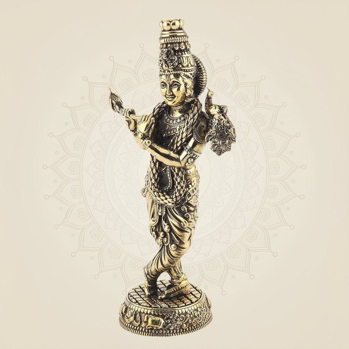 Peacock Krishna figurine