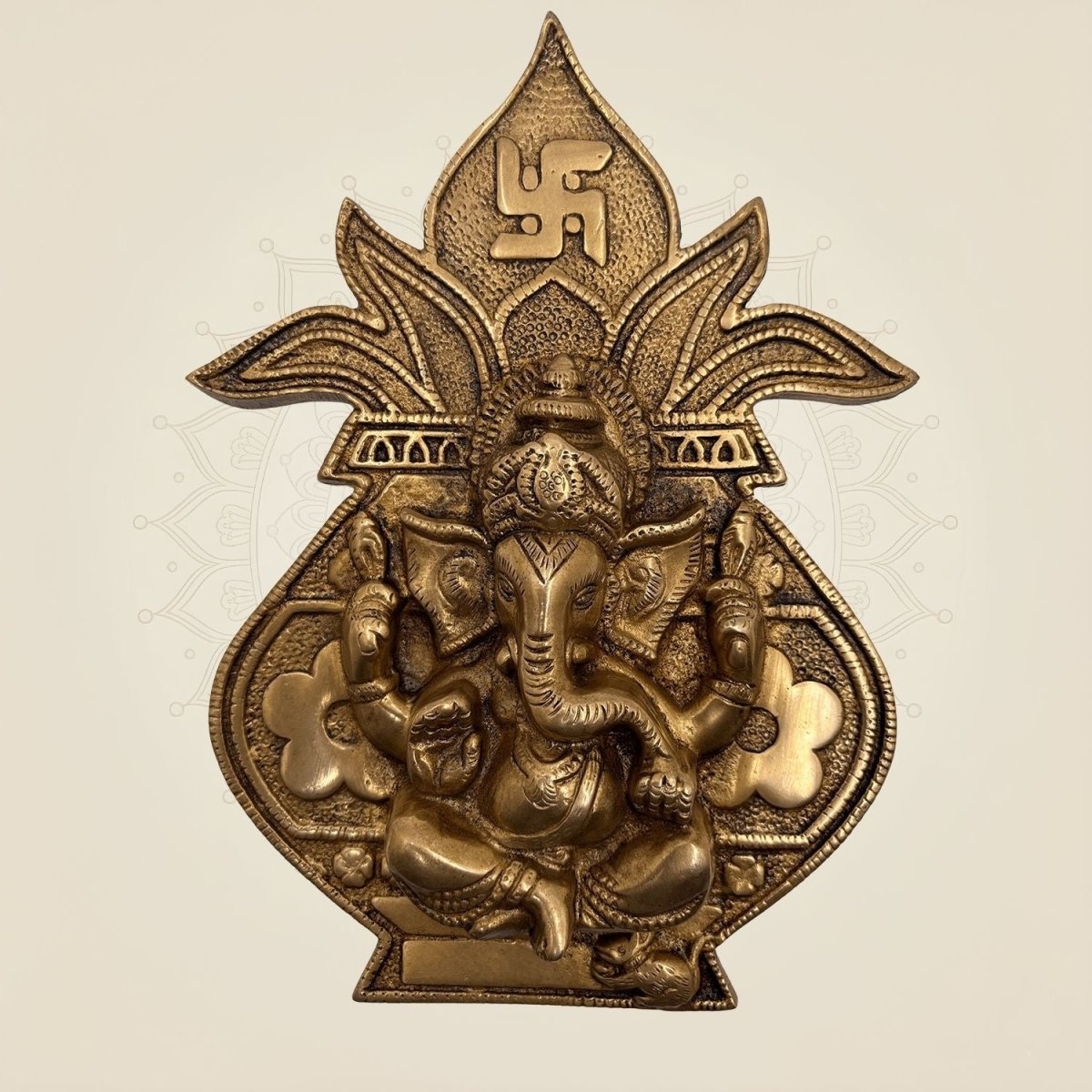 Handmade brass wall art of Ganesha on a Kalash