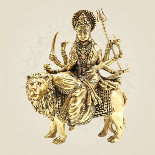 Brass Goddess Durga Idol on Lion • Divine Multi-Armed Idol with Shakti Weapon – 9.25"
