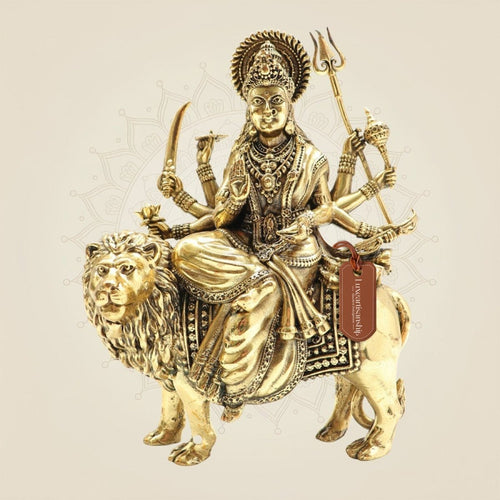 Brass Goddess Durga Idol on Lion • Divine Multi-Armed Idol with Shakti Weapon – 9.25"
