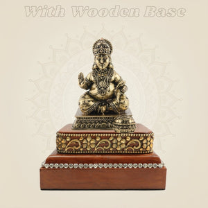 Brass Kuber Statue on Wooden Base