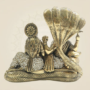 Brass Lakshmi Narayan Idol 6" Seated on Sheshnag Highlighted by Radiant Stone - Luxeartisanship