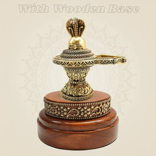 Brass Shiva Lingam 5" Featuring Naag Canopy with Round Wooden Base
