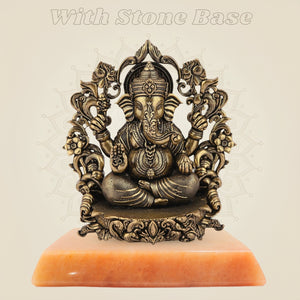 Chaturbhuj Ganesha murti on gemstone base
