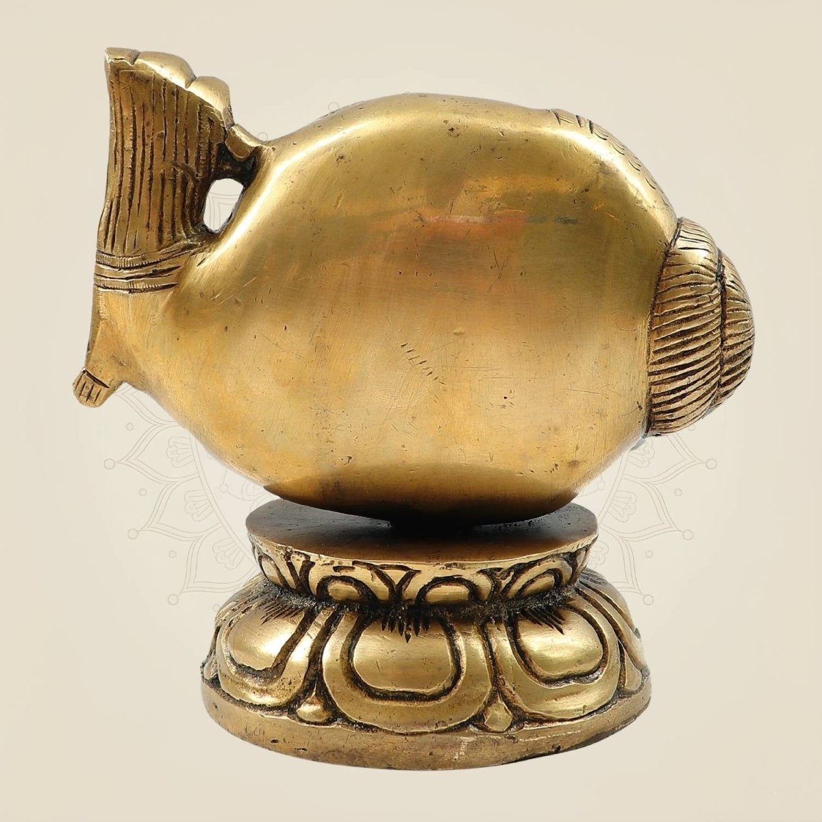 Brass Ganesh Sitting in Shankh on Peacock Design Idol 5.5"