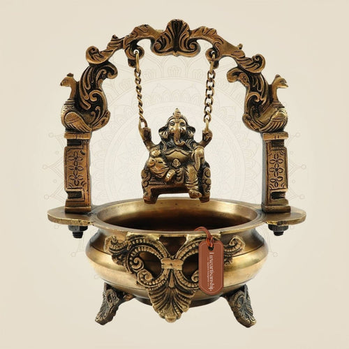 Elegant Brass Ganesh Idol on Jula Swing with Urli for Home & Gift Decor - 9.25"