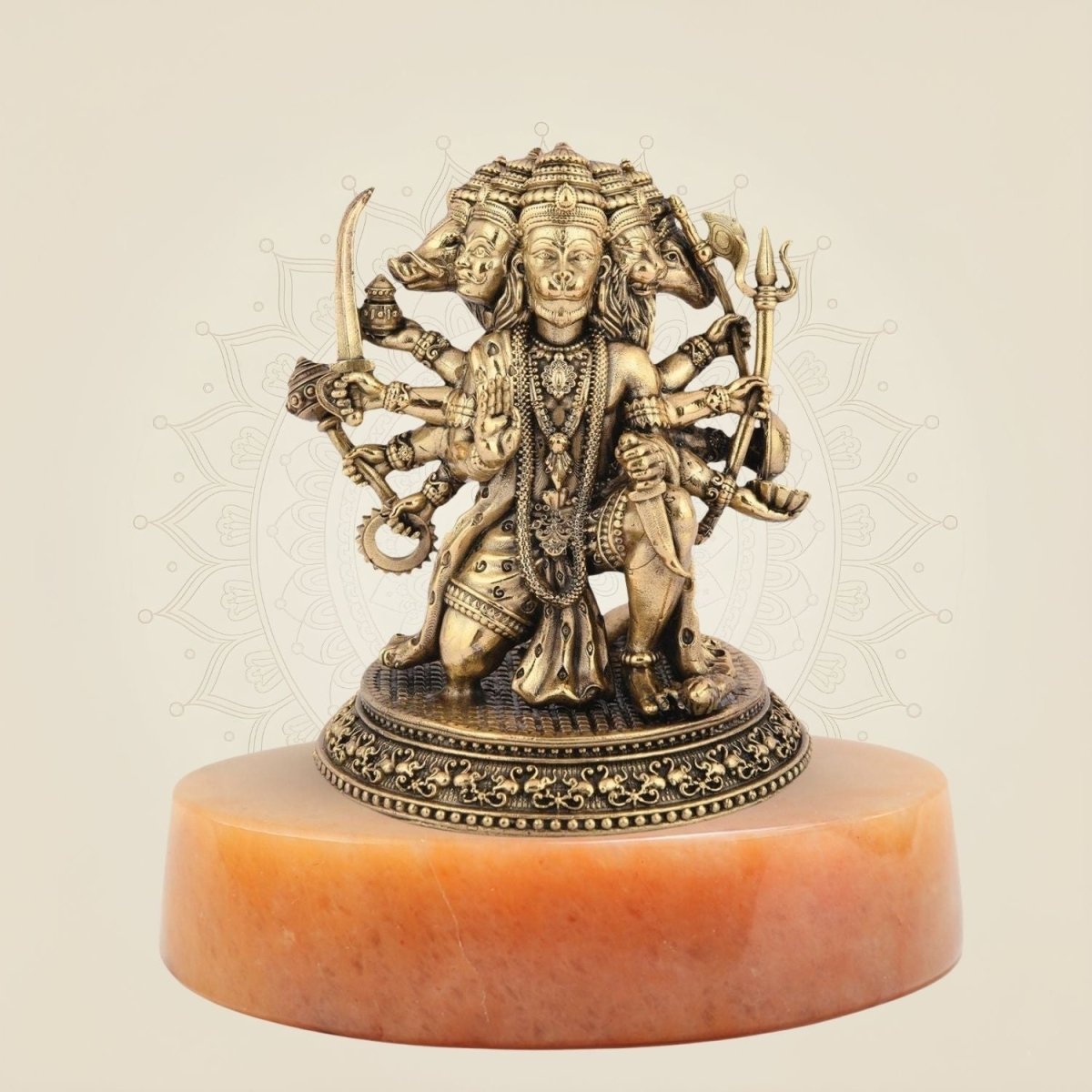 Five-faced Hanuman brass statue on stone base