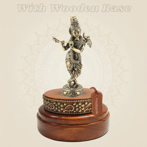 Krishna Playing the Flute Brass Idol 6.5" Displayed on a Round Wooden Platform - Luxeartisanship