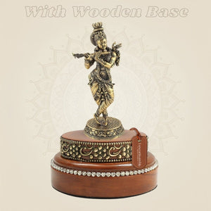 Brass Krishna Idol on a Wooden Base