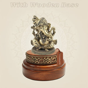 4 inch Brass Ganesha Idol in Graceful Form on Round Wooden Base