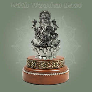 Silver - Plated Brass Chaturbhuja Ganesh Idol 5″ with Round Wooden Base - Luxeartisanship