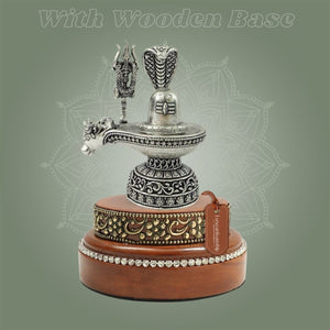 Silver Plated Shiva Lingam Idol 4" in Brass with Handcrafted Wooden Stand - Luxeartisanship