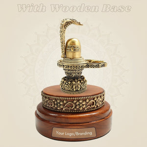 Traditional Brass Shiva Lingam with Naag Canopy on Wooden Base 4.25" - Luxeartisanship